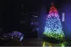 A living room scene with a decorated Christmas tree and furniture. Náhled obrázku produktu