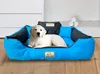 A golden retriever puppy lies in a blue and gray dog bed. Náhľad obrázku produktu