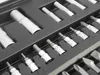 A close-up view of a tool kit with various sockets and bits organized in a black case. Anteprima dell’immagine prodotto