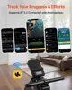 A rowing machine console with multiple phone screens displaying app data, set in a living room. Produktbild-Vorschau