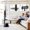 A family is watching TV in a living room, with a TV stand and TV shown prominently. Podgląd zdjęcia produktu