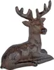A brown, textured figurine of a lying deer with antlers, set against a white background. Produktbild-Vorschau