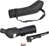 A black spotting scope, a black carrying case with a strap, a small black tripod, and a small circular accessory are arranged on a white background. Produktbild-Vorschau