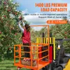 A person is picking apples from a tree while standing on a forklift attachment. Produktbild-Vorschau