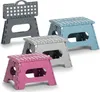 A collage of four folding step stools in different colors. Náhľad obrázku produktu