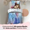 A child sleeping in a bed with Frozen-themed bedding. Produktbild-Vorschau