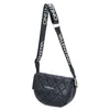 A black quilted Valentino handbag with a branded strap, shown against a white background. Anteprima dell’immagine prodotto