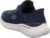 A side view of a navy blue Skechers slip-on sneaker with a white sole. Náhľad obrázku produktu