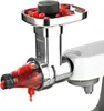 A close-up shot of a kitchen appliance attachment processing raspberries. Anteprima dell’immagine prodotto