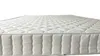 A close-up, angled view of a white mattress. Produktbild-Vorschau