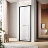 A modern bathroom with a shower enclosure, bathtub, and vanity. Voir les images du produit