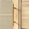 A close-up view of a wooden cabinet with a rattan panel and a gold handle. Podgląd zdjęcia produktu