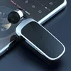 A close-up shot of a Bluetooth earphone and its charging case resting on a smartphone screen. Produktbild-Vorschau