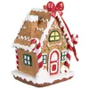 A decorative gingerbread house ornament. Produktbild-Vorschau