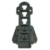A gray plastic furniture fitting is shown against a white background. Produktbild-Vorschau
