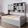 A grey wooden daybed with a built-in bookshelf and storage units. Náhľad obrázku produktu
