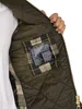 Close-up of the inside lining of a jacket, showing a care label. Produktbild-Vorschau