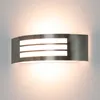 A modern outdoor wall light with three illuminated horizontal bars, mounted on a wall. Produktbild-Vorschau
