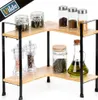 A two-tier corner shelf unit made of wood and metal, holding various spice jars, grinders, and an oil bottle. Náhled obrázku produktu