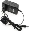 A black AC adapter with a European plug and a coiled cable with a DC connector. Náhled obrázku produktu