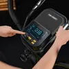 A close-up of a person's hands interacting with the control panel of an elliptical trainer. Produktbild-Vorschau