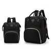 Two black backpacks are displayed side-by-side against a white background. Náhled obrázku produktu