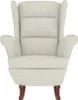A cream-colored velvet rocking chair with wooden legs, presented on a white background. Náhled obrázku produktu