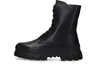A black leather boot with a thick sole is shown against a white background. Produktbild-Vorschau
