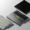 Three screen protectors are laid out on a light gray surface. One is in its packaging, and two are being applied to devices. Náhled obrázku produktu