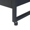 A close-up view of the bottom corner of a black metal plant stand, showing one of its adjustable feet. Produktbild-Vorschau