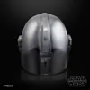 A close-up, rear view of a silver Mandalorian helmet against a black background. Voir les images du produit