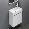 A white wall-mounted vanity with a sink and faucet is shown in a modern bathroom setting. Voir les images du produit