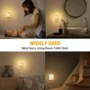 A collage of four images showing a night light being used in different home settings: a baby room, a bathroom, a nursery, and stairs. Produktbild-Vorschau