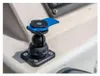 A close-up shot of a black and blue mounting bracket with a blue lever, attached to a light-colored surface, likely a boat or vehicle dashboard. Anteprima dell’immagine prodotto