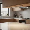 A modern kitchen with wooden cabinets and a countertop. Produktbild-Vorschau