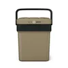 A tan and black portable cooler with a black handle, shown from the front on a white background. Anteprima dell’immagine prodotto