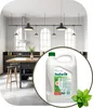A kitchen scene with a bottle of dish soap in the foreground. Náhled obrázku produktu