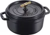 A black Staub cast iron pot with a gold handle is shown against a white background. Náhled obrázku produktu