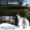 A woman is operating a patio umbrella with a crank mechanism, next to outdoor furniture. Voir les images du produit