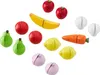 A collection of toy fruits and vegetables, cut in half, arranged on a white background. Produktbild-Vorschau