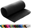 A rolled-up black fleece blanket is shown on a white background. Below the blanket, a row of rolled-up blankets in various colors is displayed. Náhľad obrázku produktu
