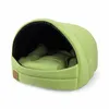 A green pet bed with a hooded opening. Náhľad obrázku produktu