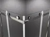 Close-up view of a corner shower enclosure with glass panels and chrome framing. Produktbild-Vorschau