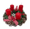 A Christmas advent wreath with four red candles, pine branches, pinecones, and red and white checkered ribbon. Produktbild-Vorschau