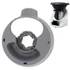 A close-up of a gray kitchen appliance part with a smaller kitchen appliance in the background. Produktbild-Vorschau