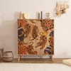 A cabinet with a tiger print design in a room setting. Produktbild-Vorschau