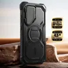 A rugged black phone case is displayed on a rocky, desert-like surface with a blurred background. Produktbild-Vorschau