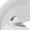 A collage of close-up shots of a white LED ceiling light. Voir les images du produit