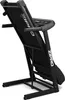 A black folding treadmill is shown from a side angle, with its running deck tilted upwards. Produktbild-Vorschau
