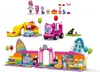 A collection of LEGO building blocks and figures, including a party room, a train, and a slide. Produktbild-Vorschau